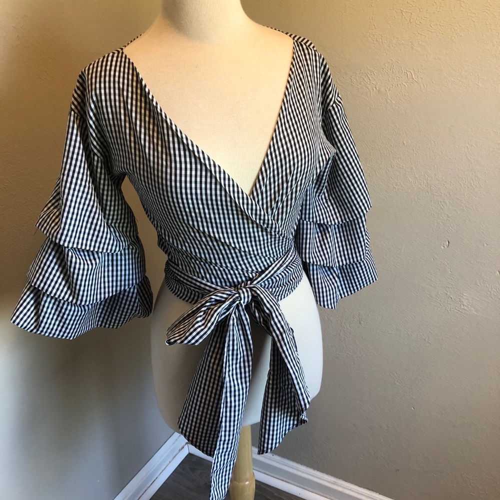 Vivid Importers Checkered Bell Sleeve Wrap Blouse